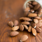 pile-almonds-inside-fallen-jar