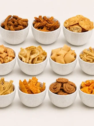 Enjoy Chandra Foods Premium Tea Time Combo with authentic Indian snacks including Gathiya, Fafda, Chakri, Papdi, Para and more. Perfect for tea breaks.