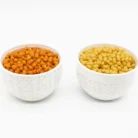 Two types of boondi in two white ceramic bowls Masala Boondi & Plain Boondi
