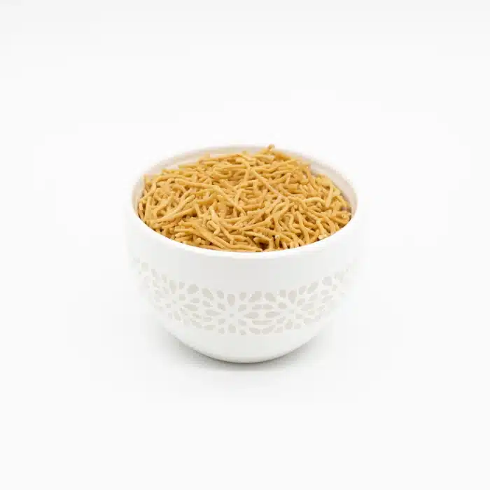 Thikhi Sev - Authentic Indian Snacks in a white ceramic Bowl by Chandra Foods